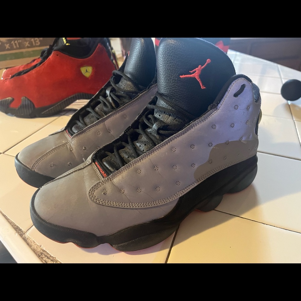 I’m selling these Jordan 13s “reflective silver” infrared.